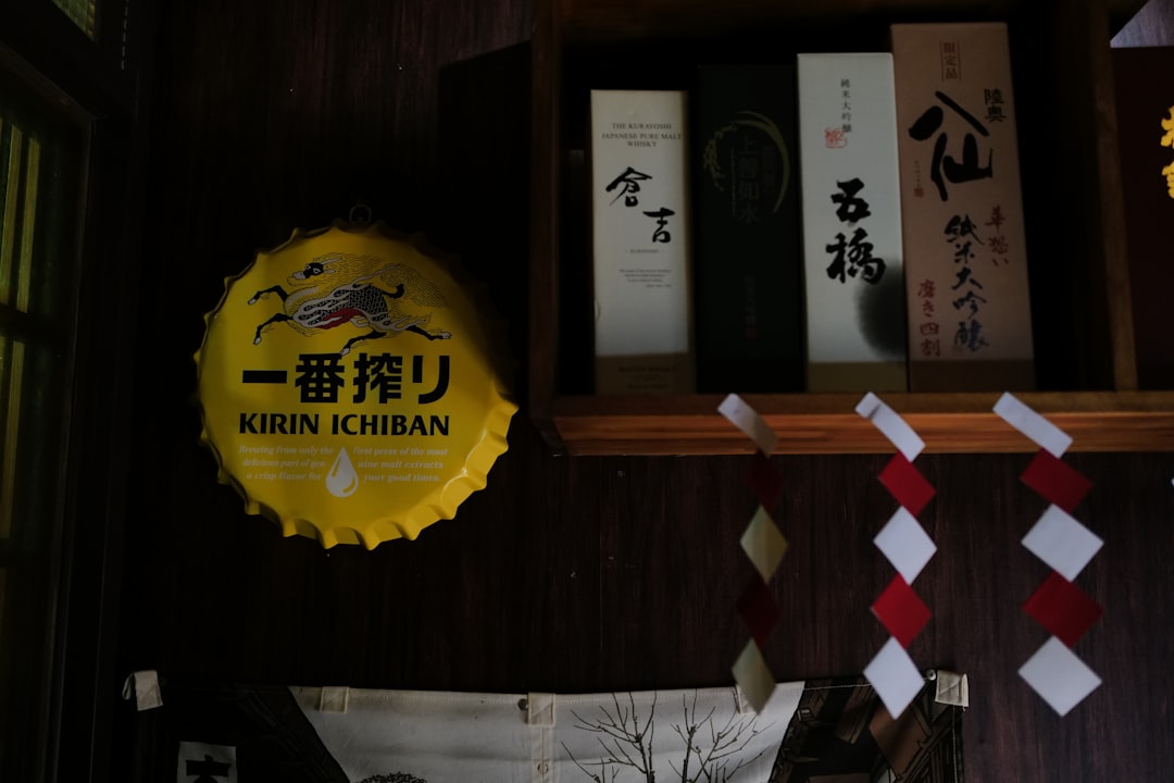 Kirin ichiban beer cap decoration on dark wooden wall