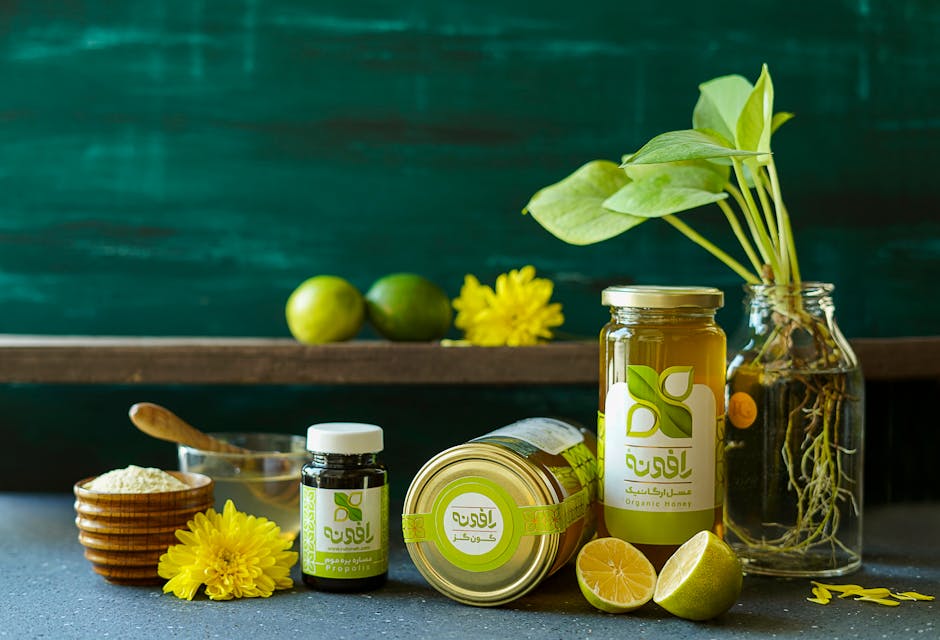 Vibrant product display featuring organic honey and fresh citrus with natural decor elements.